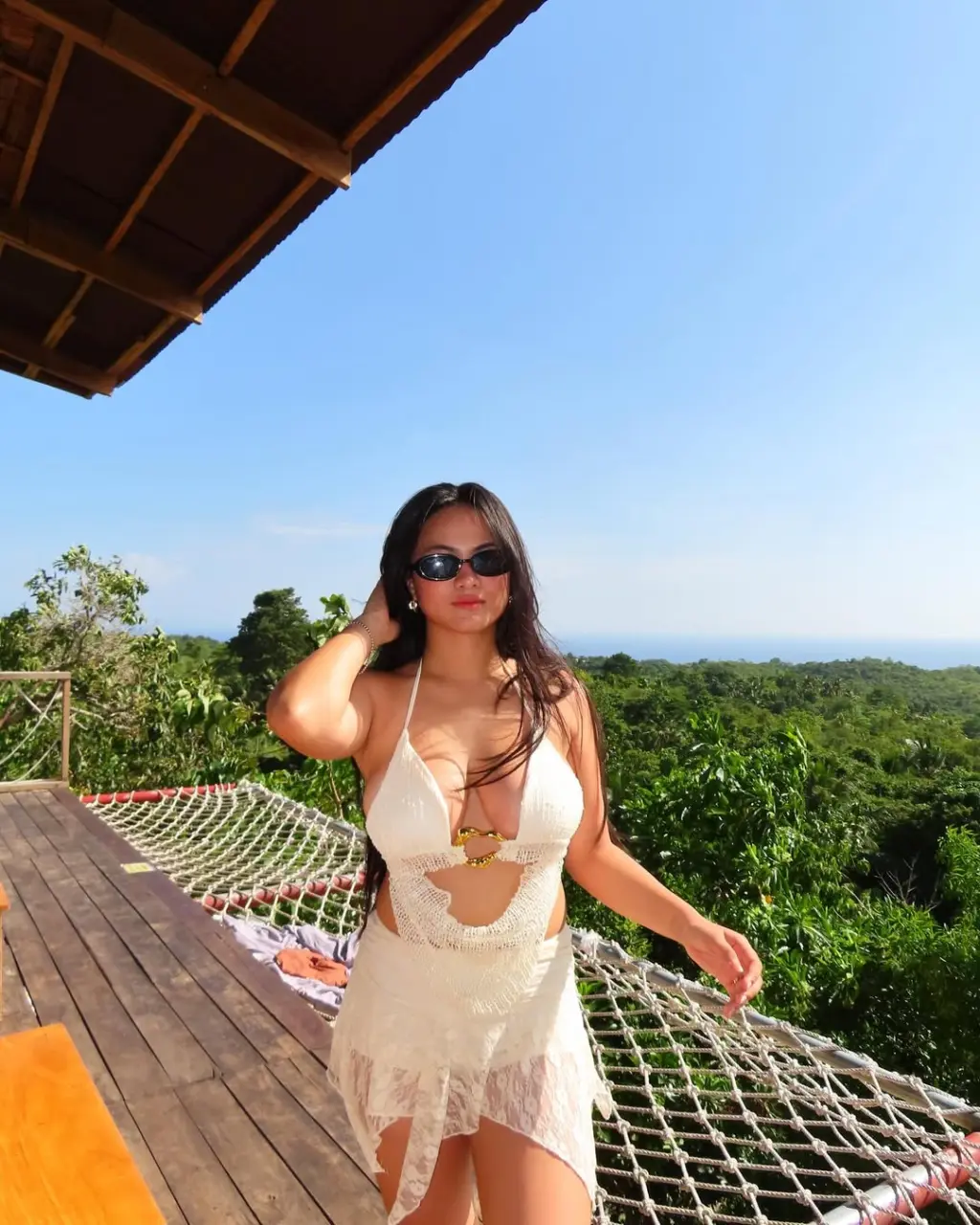 on island time 🐚🧘🏻_♀️🌊🌺 (1).webp