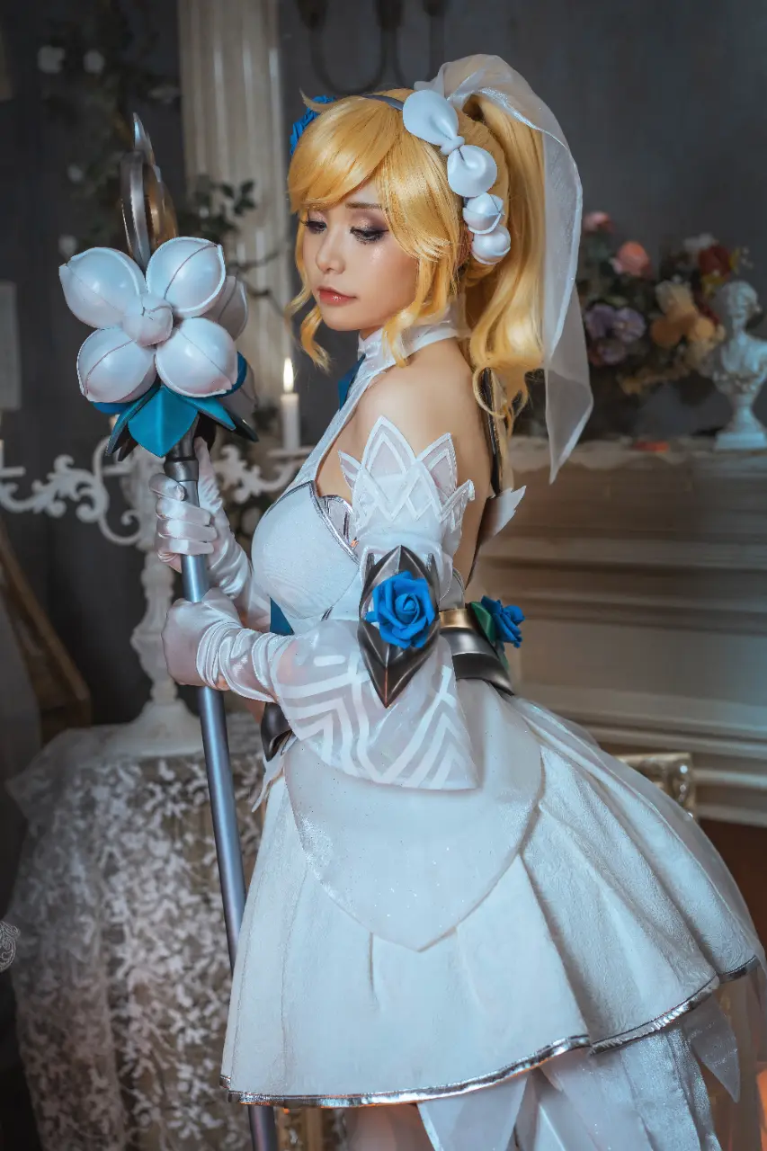Nekokoyoshi (爆机少女喵小吉) cosplay Lux - League of Legends (4).webp