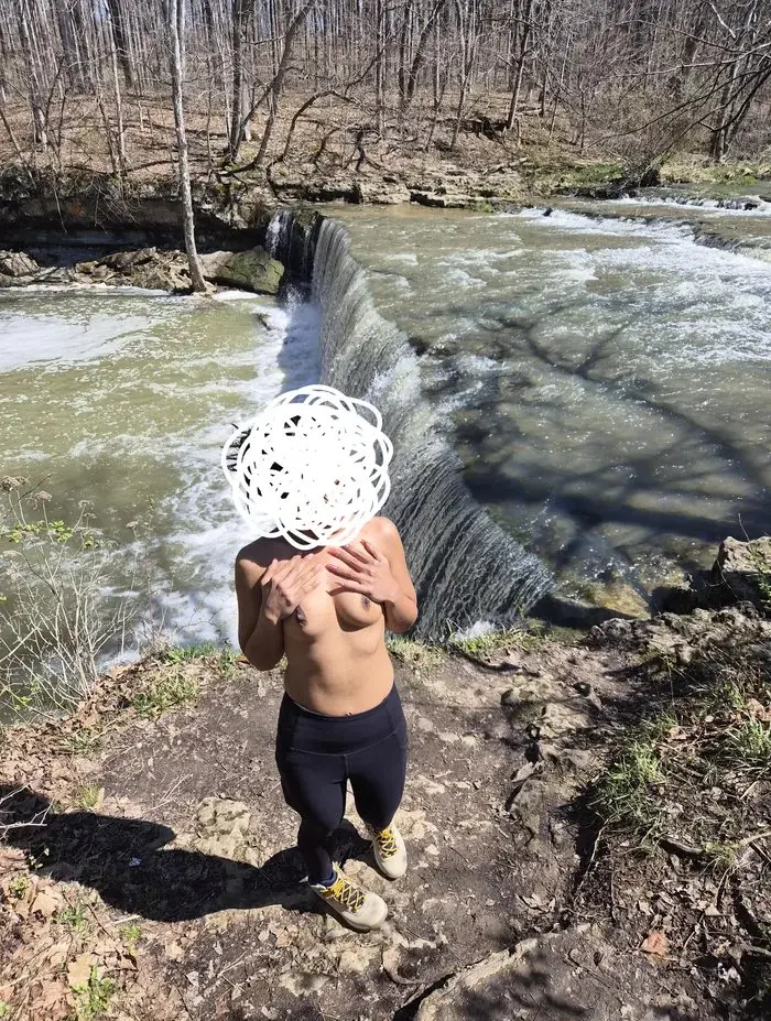Tits-out-by-the-waterfall-1774912407931.webp