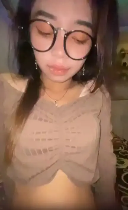 Asian Cute Girl with Glasses