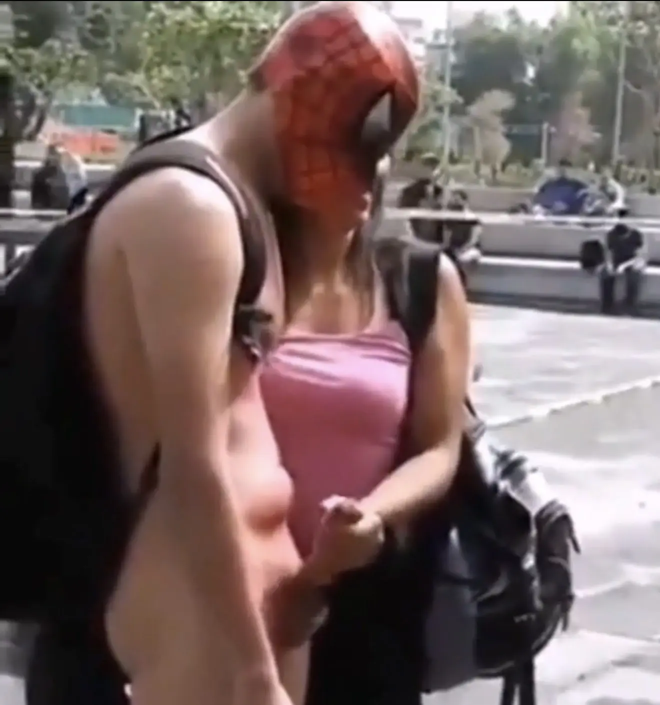 A girl jerking off a stranger on street making him cum